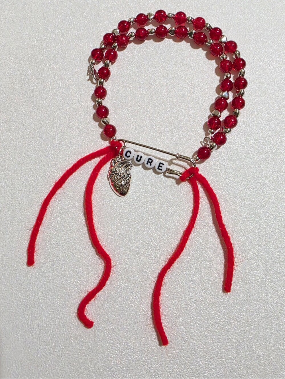 Handcrafted Beaded CURE Necklace